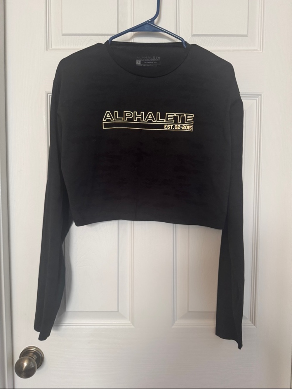 Alphalete Black Cropped Long Sleeve Top with Cream Logo